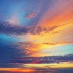 Obraz premium Vibrant sunset sky with colorful clouds orange