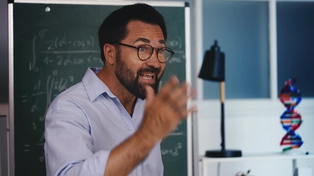 Nervous middle-aged math teacher reprimanding students, classroom discipline