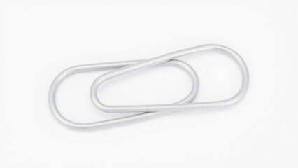 Silver Paper Clip Close Up Office Supply on White Background