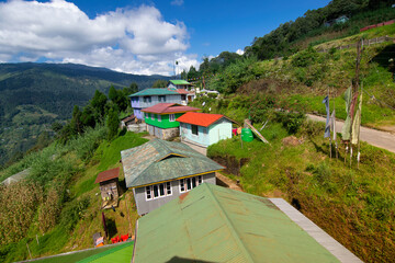 Okhrey village, Himalayan mountain range in the background . Okhrey is a remote village with breath taking scenic natural vista of world famous Himalayan Mountains in background, in Sikkim, India.
