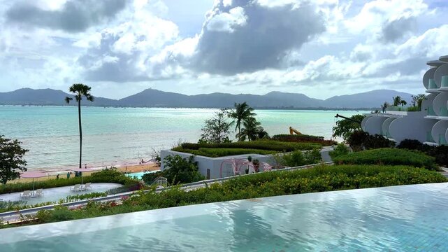 Beautiful view from Kao Khad next to Cape Panwa on the island of Phuket Thailand. Views of the turquoise Blue waters of the Andaman Sea and small islands off the coat of Phuket