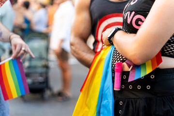 Lgbt people showing rainbow flag at pride parade