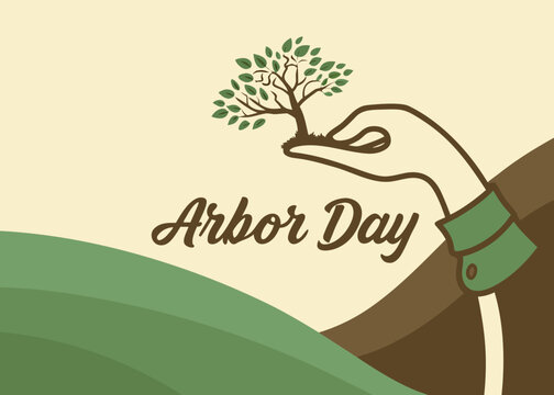 Arbor day celebration with hand planting a tree