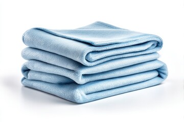 Stack of soft blue fleece blankets folded neatly isolated on white background