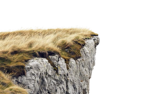 Rocky cliff edge with dry grass on top, isolated on transparent cutout background