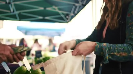 Vibrant exchange of fresh strawberries at a local farmer's market showcases community and healthy living.