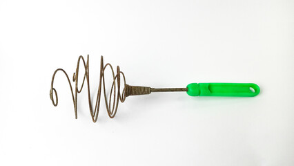 rusty egg beater cooking utensils isolated on white background.