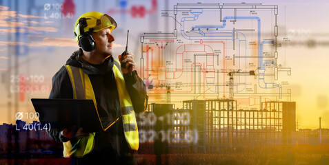 Engineer in safety gear with laptop and radio oversees construction site with digital building plans overlay. Smart construction, architecture, technology, industrial work.