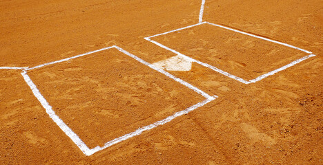 Fototapeta premium Baseball Diamond Base or Plate White Against Dark Dirt for Competition and Playing Game