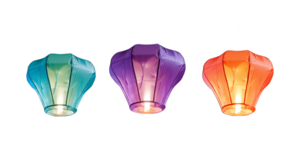 Three colorful lanterns glowing against a transparent  background in a horizontal composition view