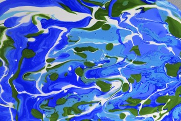 Marbled blue and white abstract background. Liquid marble ink pattern.