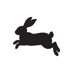 Obraz premium Silhouette of a rabbit jumping with long ears and a fluffy tail