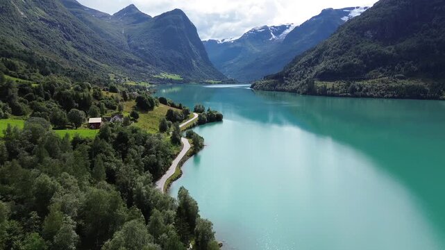 Aerial View of Car Driving Along Oldevatnet Lake in Olden, Norway