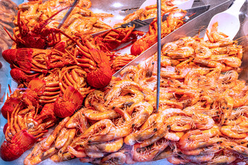 Lobsters and shrimips being sold at The Queen Victoria Market. Built in 1860 years it is one of Melbourne's major tourist sites. Australia, Melbourne, Dec 2019