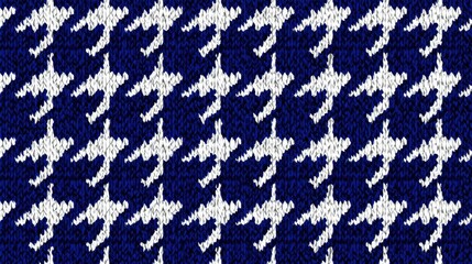 A detailed fabric features a houndstooth pattern in navy blue and white. The repeating design highlights the artistry of textile craftsmanship, showcasing a bold and striking aesthetic.