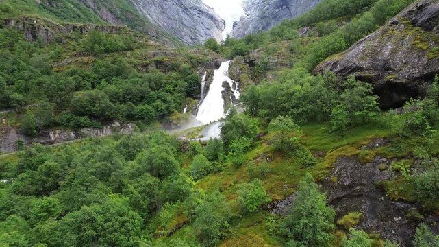 Drone View of Kleivafossen Waterfall and Briksdalsbreen Glacier in Briksdalen, Norway
