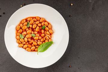 Bean stew tomato sauce cranberry beans vegetable dish beans borlotti fresh delicious gourmet food background on the table rustic food top view copy space keto and paleo diet vegan and vegan food