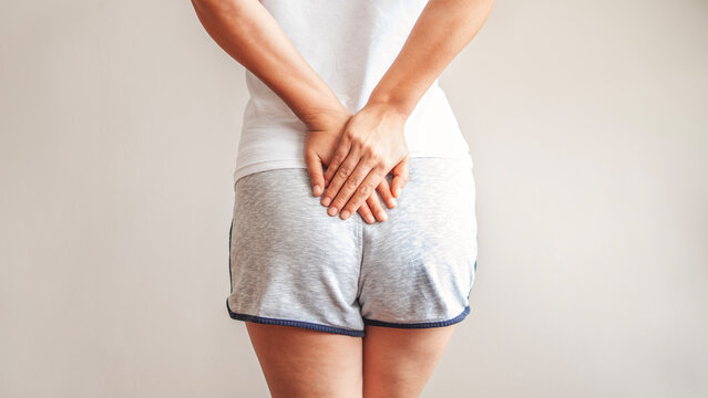 Person with hemorrhoids and constipation