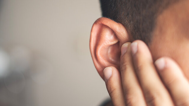 Ear pain and clogged ears concept