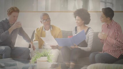 man lifting mug grabbing takeaway cup starting business colleagues reviewing blue folder and papers