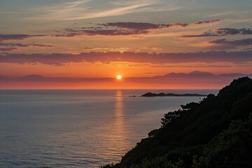 Fototapeta premium Panoramic View of Sunset Over the Sea Silhouette