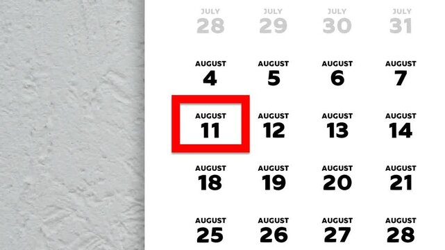 The date August 11th marked with a red cursor on the wall calendar 2025