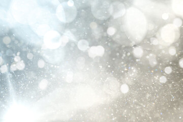 Shiny silver background with sparkling glitter, bokeh effect