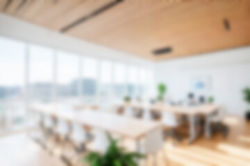 Fototapeta premium Blurred Modern Office Interior Background Minimalist Workspace, Soft Focus Light Office, Corporate Design Overlay