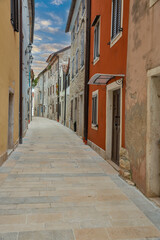 Obraz premium Narrow stone street in historic Istrian town Novigrad, Croatia.