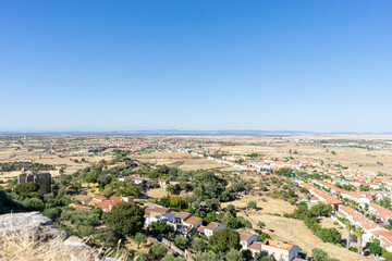 Stunning panoramic view of Trujillo, Extremadura showcasing its rich landscapes under a clear blue...