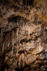 Stunning stalactites and stalagmites in the caves of Málaga, Spain, showcasing nature's artistry and beauty