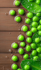 A rustic and natural composition featuring fresh green peas scattered on a clear surface with water droplets, reflecting a blurred brown wooden background. 
