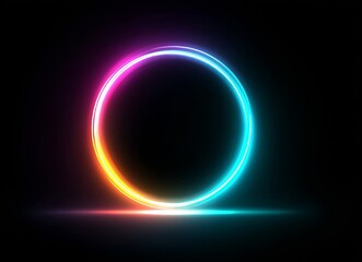 A mesmerizing circular light display is created by vibrant, concentric neon rings glowing in the dark, with the multicolored circles emitting energy and forming a pattern that is hypnotic