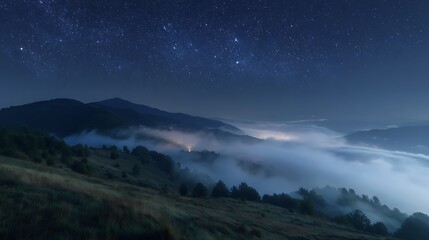 Starry night covers foggy mountains. Ethereal landscape shows mystic view. For backgrounds, web design, marketing.