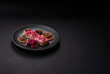 Nougat or white caramel with hazelnuts and strawberry pieces. White nougat