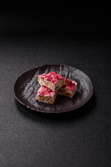 Nougat or white caramel with hazelnuts and strawberry pieces. White nougat
