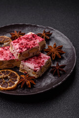 Nougat or white caramel with hazelnuts and strawberry pieces. White nougat