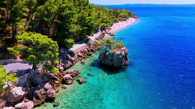 Aerial Drone Footage of Punta Rata Beach and Turquoise Adriatic Sea &ndash; Brela, Croatia