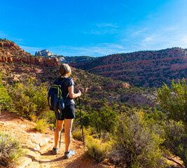 Female Hiker Overlooking The Vermillion Cliffs Above The Mansard Trail, Kanab, Utah, USA