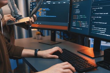 Serious of IT developers discussing intelligent website development coder system running data...