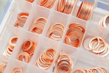 Box of new copper sealing gaskets.