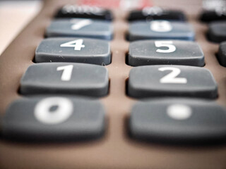 Calculator keypad from an angled perspective – structure and function.