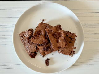 Chocolate Chip Brownies on a White Plate. 