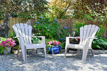 Outdoor sheltered garden patio seating for hot summer day relaxing 