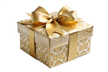 A beautifully wrapped golden gift box with an ornate pattern and a luxurious satin ribbon tied in a perfect bow isolated on a
