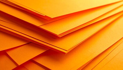 Stacked orange sheets of paper