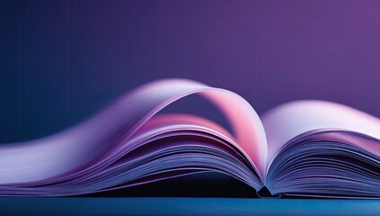 Open book in vibrant purple and pink light