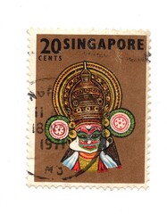 A vintage postage stamp from Singapore isolated on a white background.