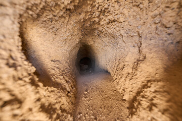 Narrow carved volcanic tunnel