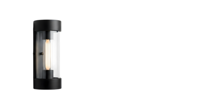 A modern black wall sconce with a clear glass cylinder and an edison bulb is mounted on a transparent